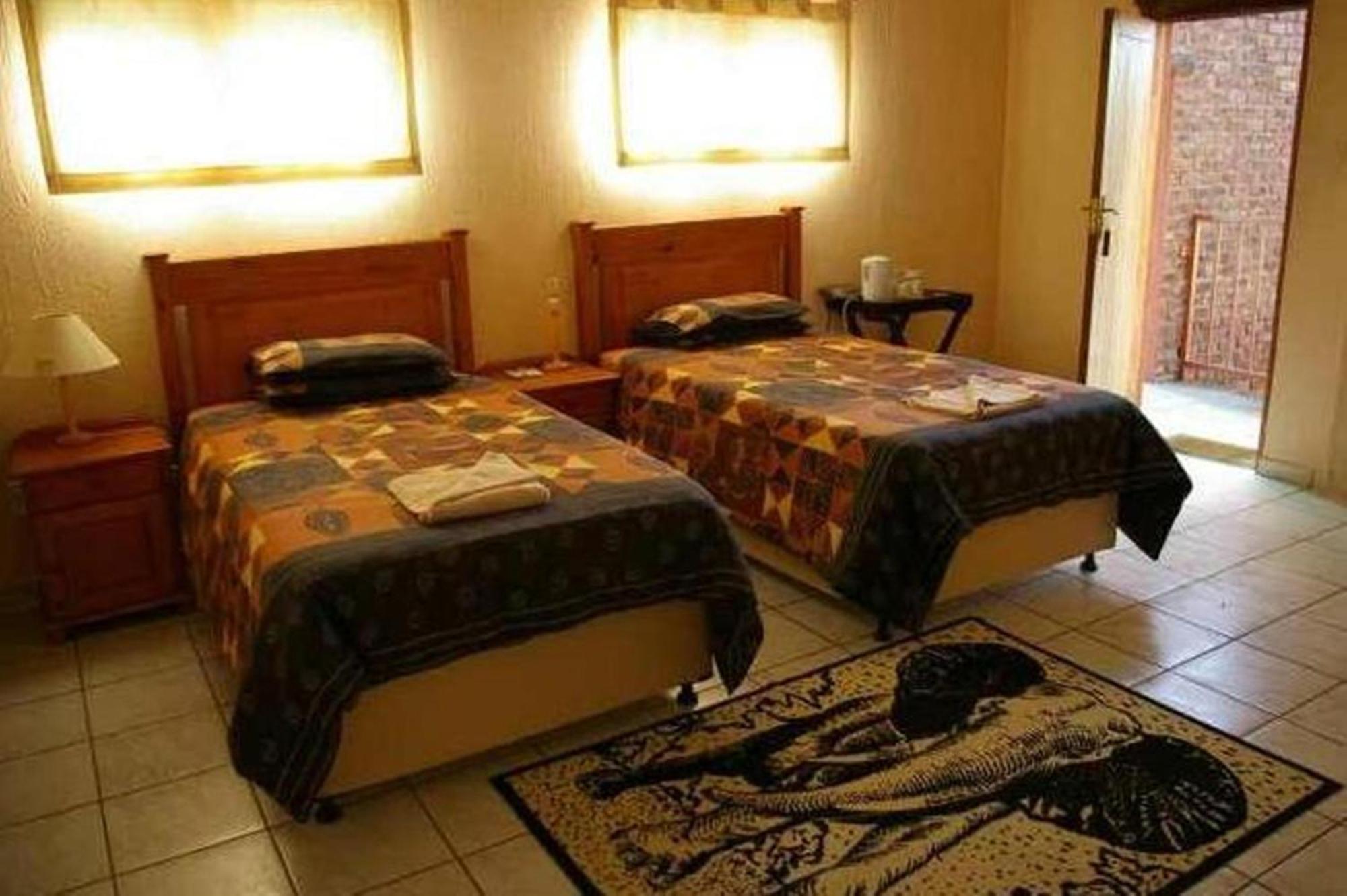 Ingwe Guesthouse Mbombela Bagian luar foto